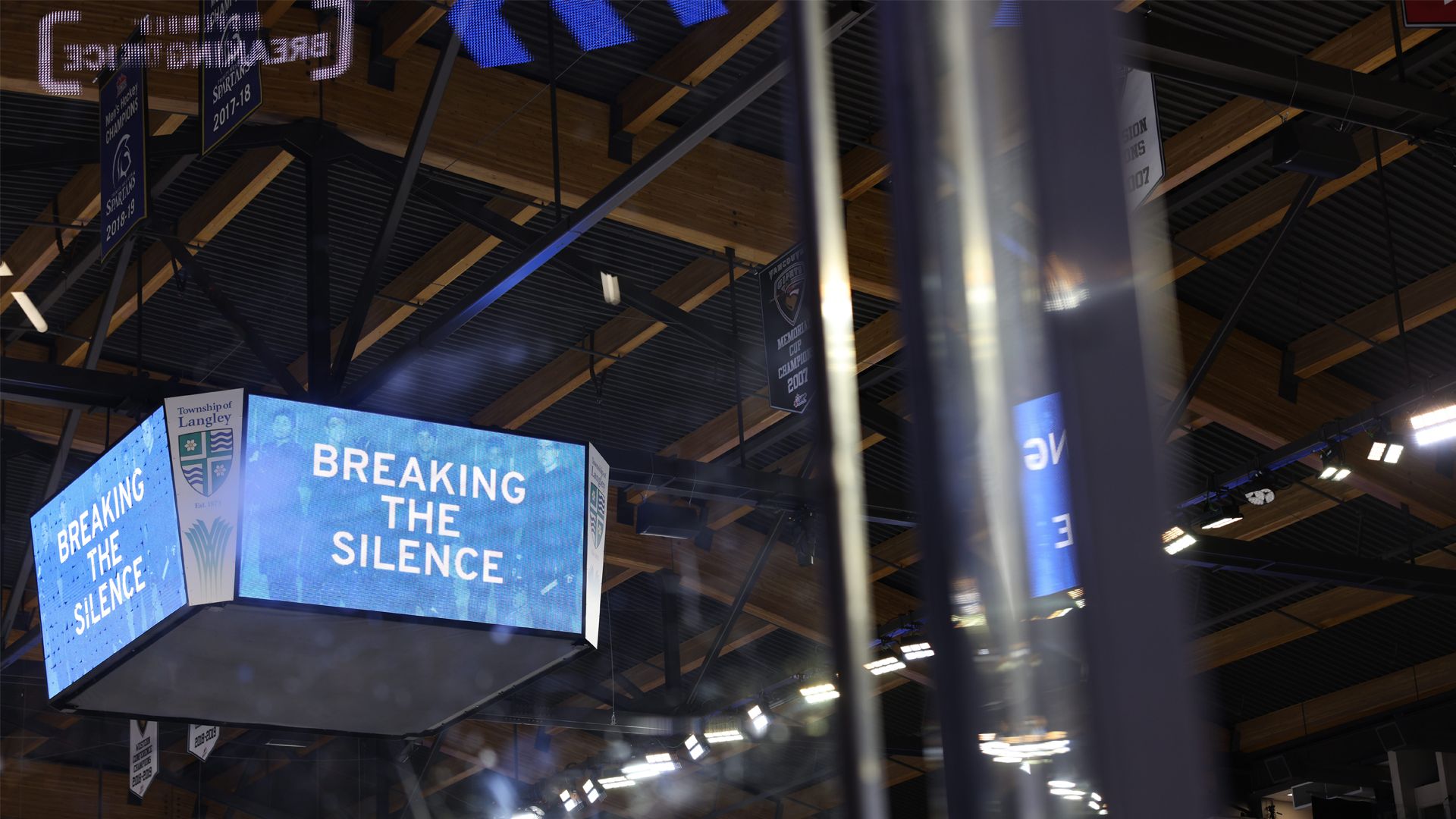 A jumbotron with blue screen and text that says "Breaking the Silence" which was at the WHL prospects game.