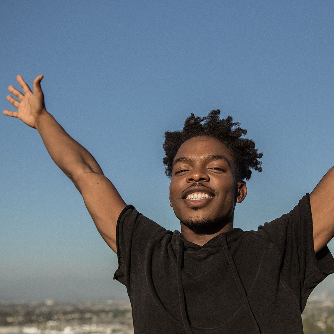 Man with arms outstretched