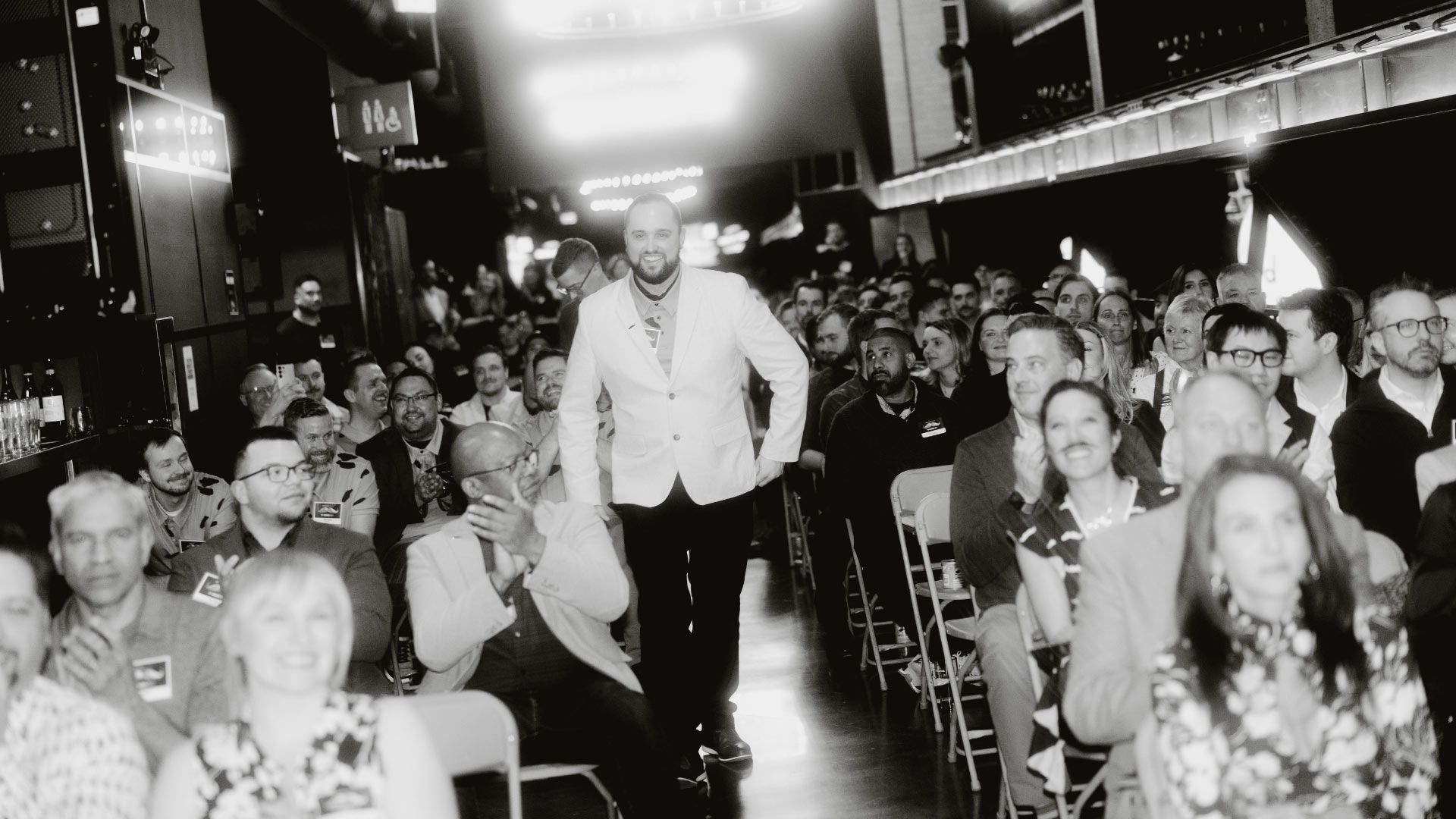 Photo of an audience watching the Movember Awards on stage.