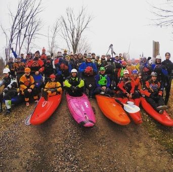 Photo of a kayaking in their gear.