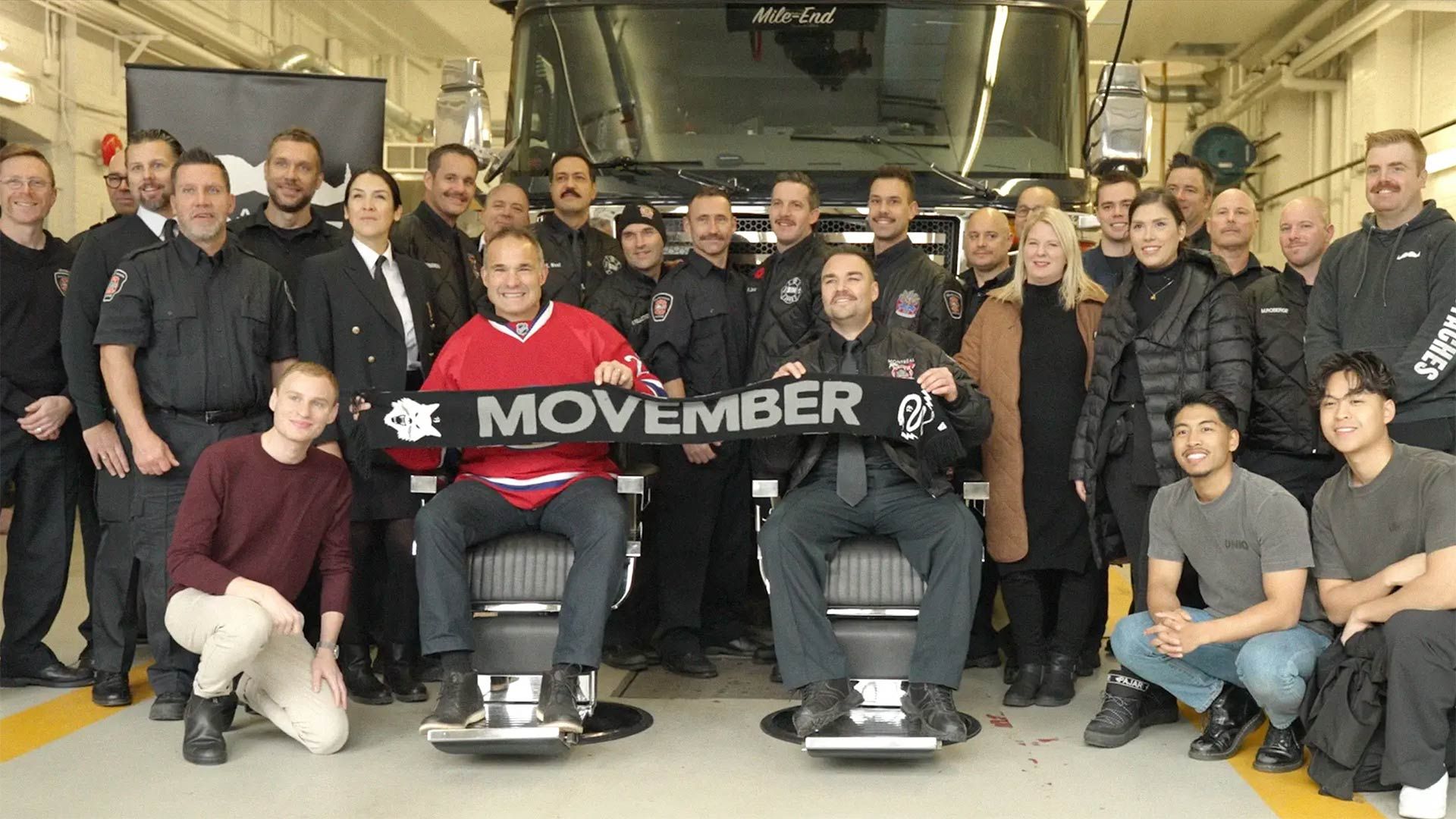 Photo showing Movember supporters at a first-responder facility in Quebec, Canada.
