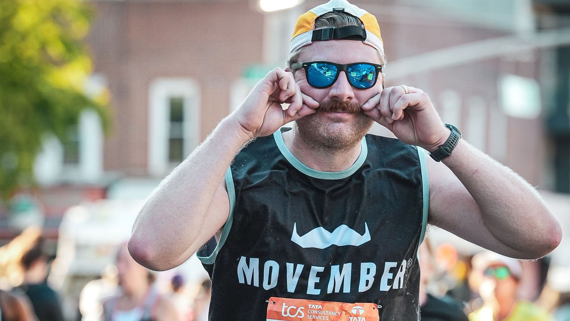 Close up of Movember supporter competing in TCS New York City Marathon.