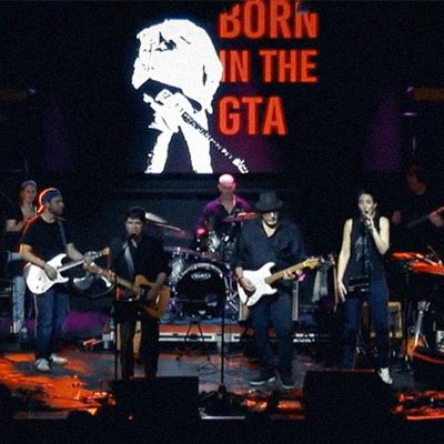 Portrait of Bruce Springsteen tribute band, Born In The GTA, performing on stage.